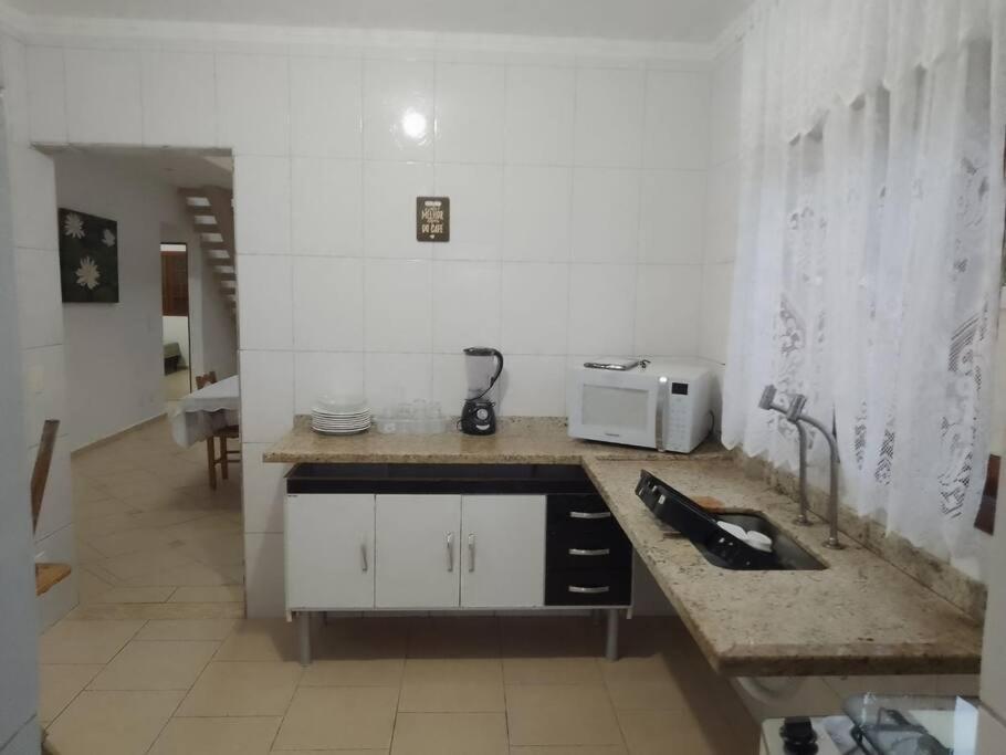 Lindo Sobrado No Condominio Бертіога Екстер'єр фото