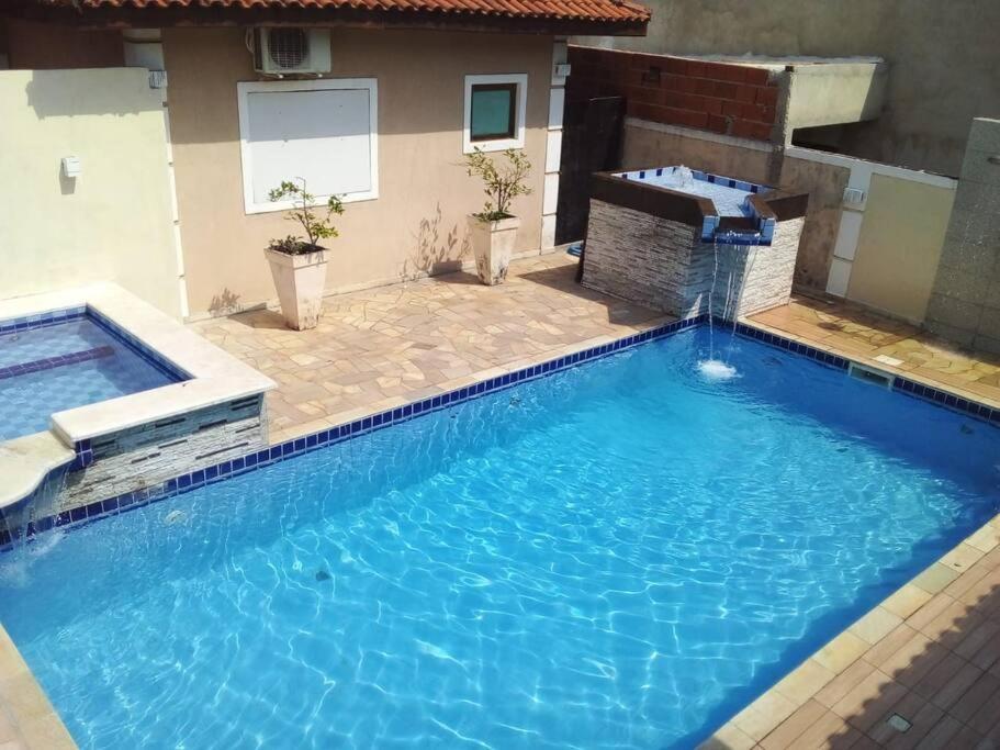 Lindo Sobrado No Condominio Бертіога Екстер'єр фото